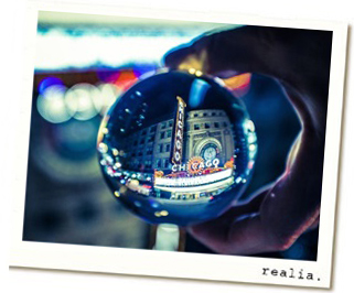 Reflection of the Chicago Theater captured in glass globe
